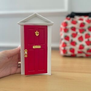 Little red tooth fairy , garden fairy or mouse door